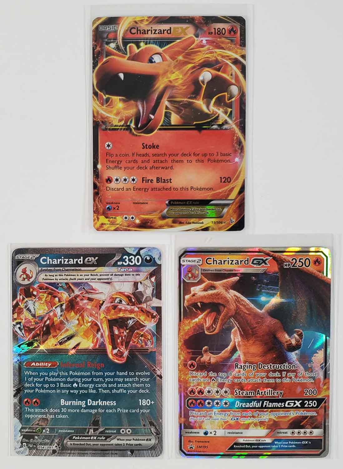 charizard gx 2019 pokemon card HOLO SM195 Black Star Promo Sun & Moon Colorless Steam Artillery (200) Fire Charizard GX Hidden Fates SV49/SV94